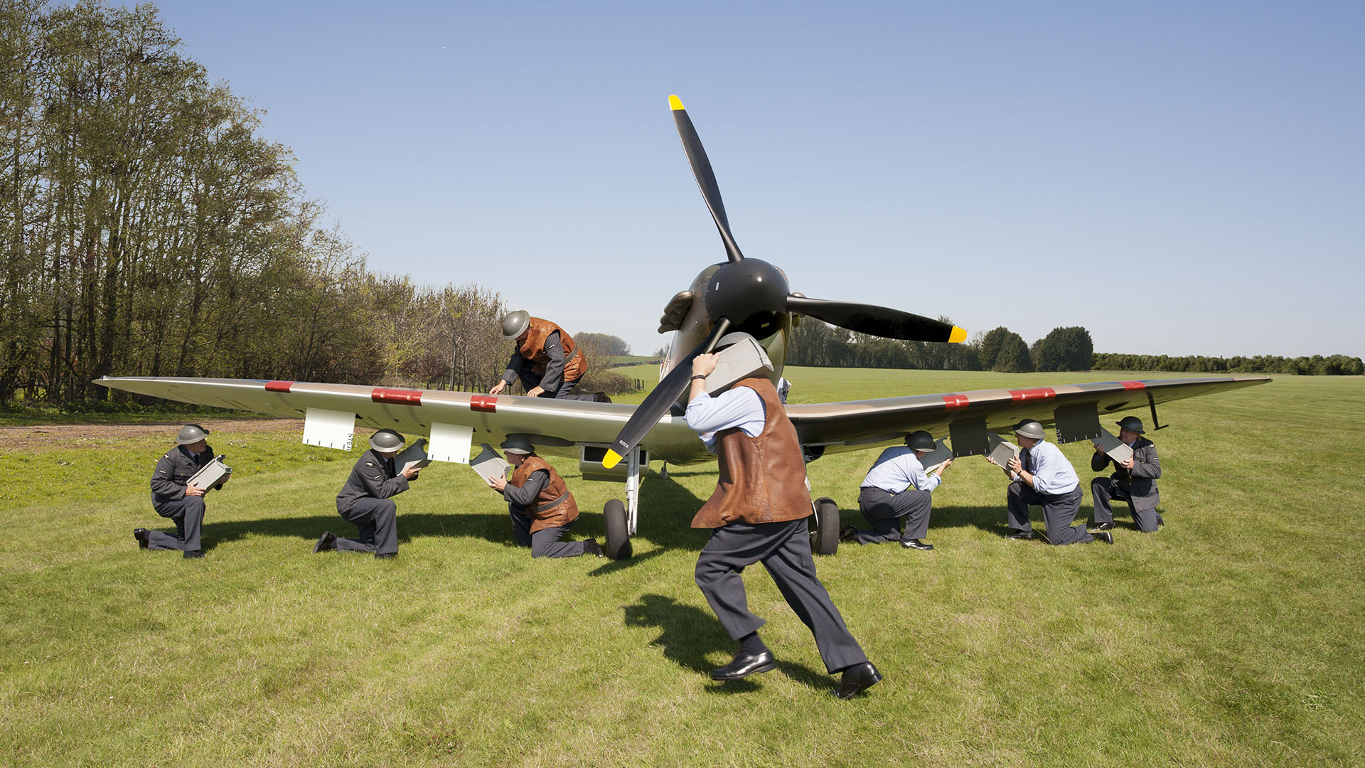 MG 5D 4724 and others carl rearming Spitfire Mk 1 v5 FINAL crop 1920x1080px